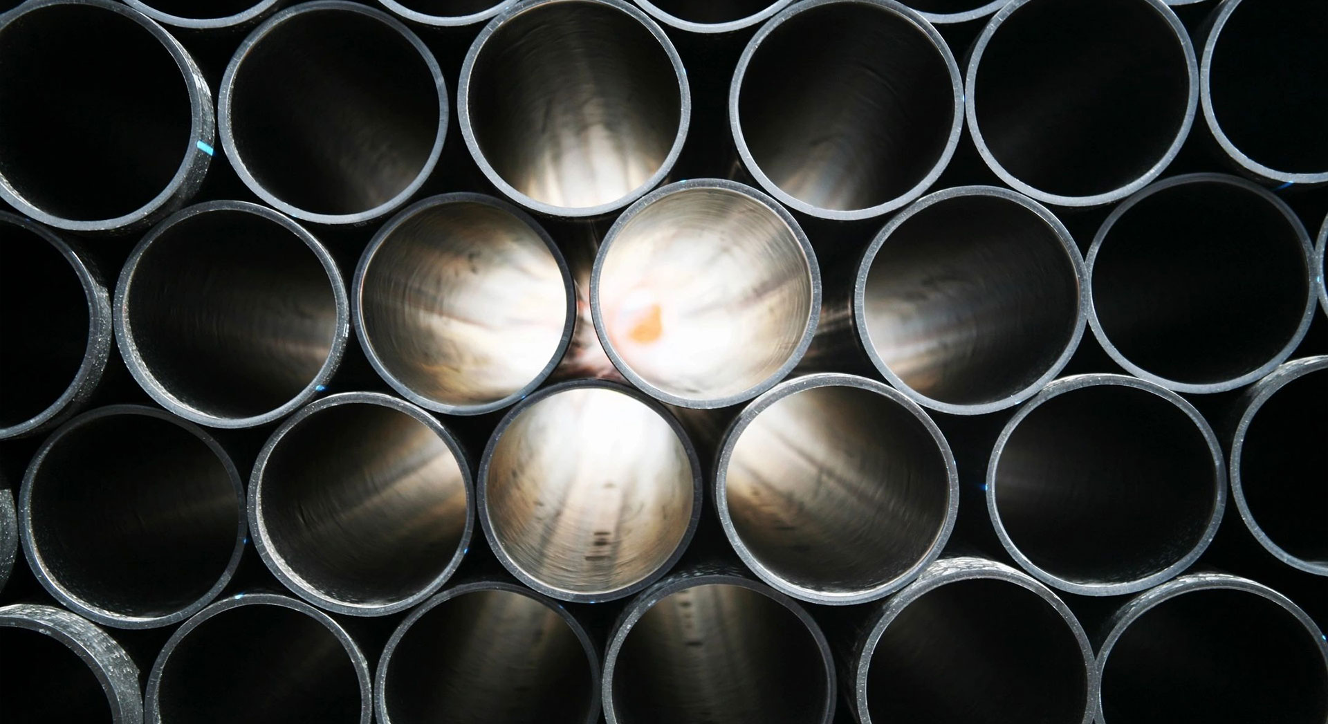 stack of gray pvc pipes